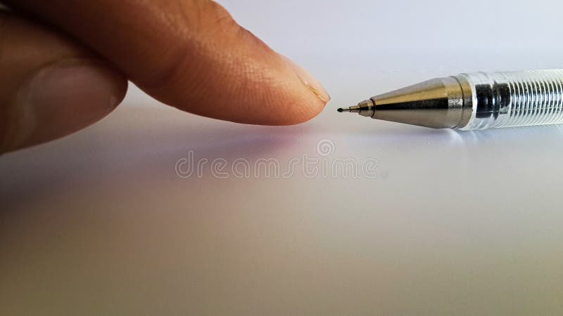 Finger Pointing Toward A Pen Nib Stock Photo - Image Of Small, Peak encequiconcerne Peak Finger
